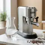 Machine espresso DeLonghi acier inoxydable avec café et eau